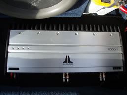 JL Audio amplifier on the right